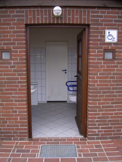 Open door to an accessible toilett