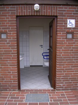 Open door to an accessible toilett